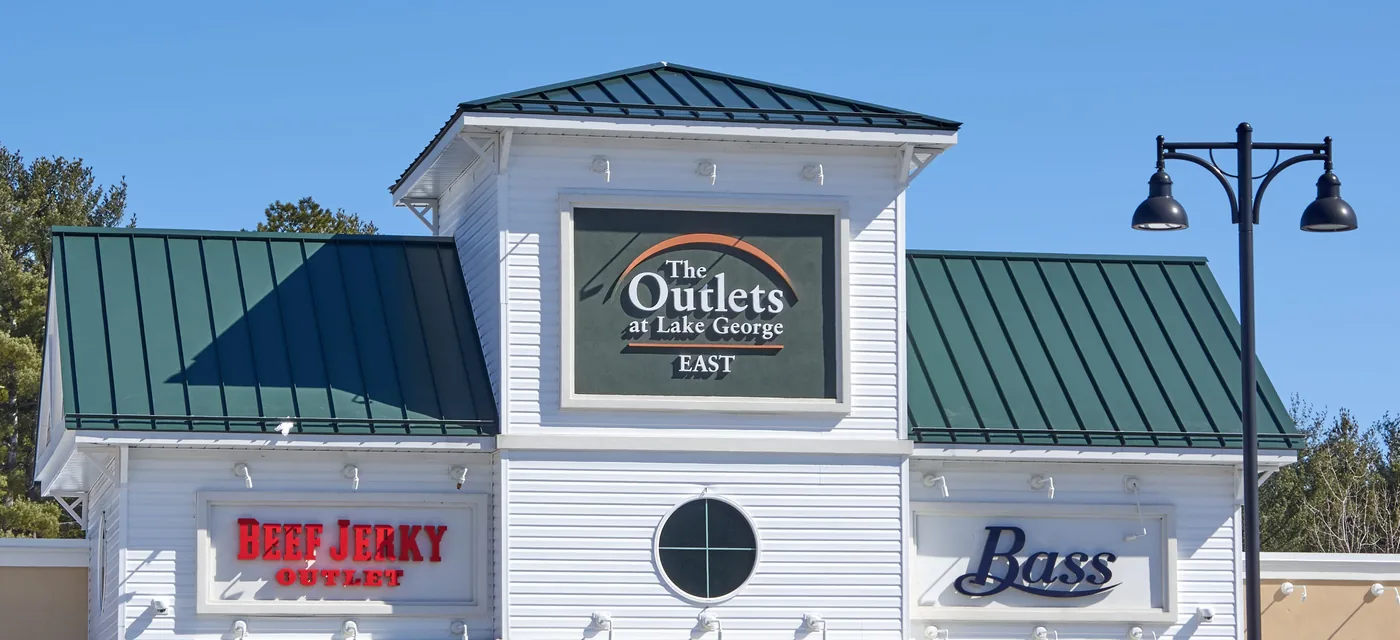 Standing seam metal roof on a multi-tenant retail building