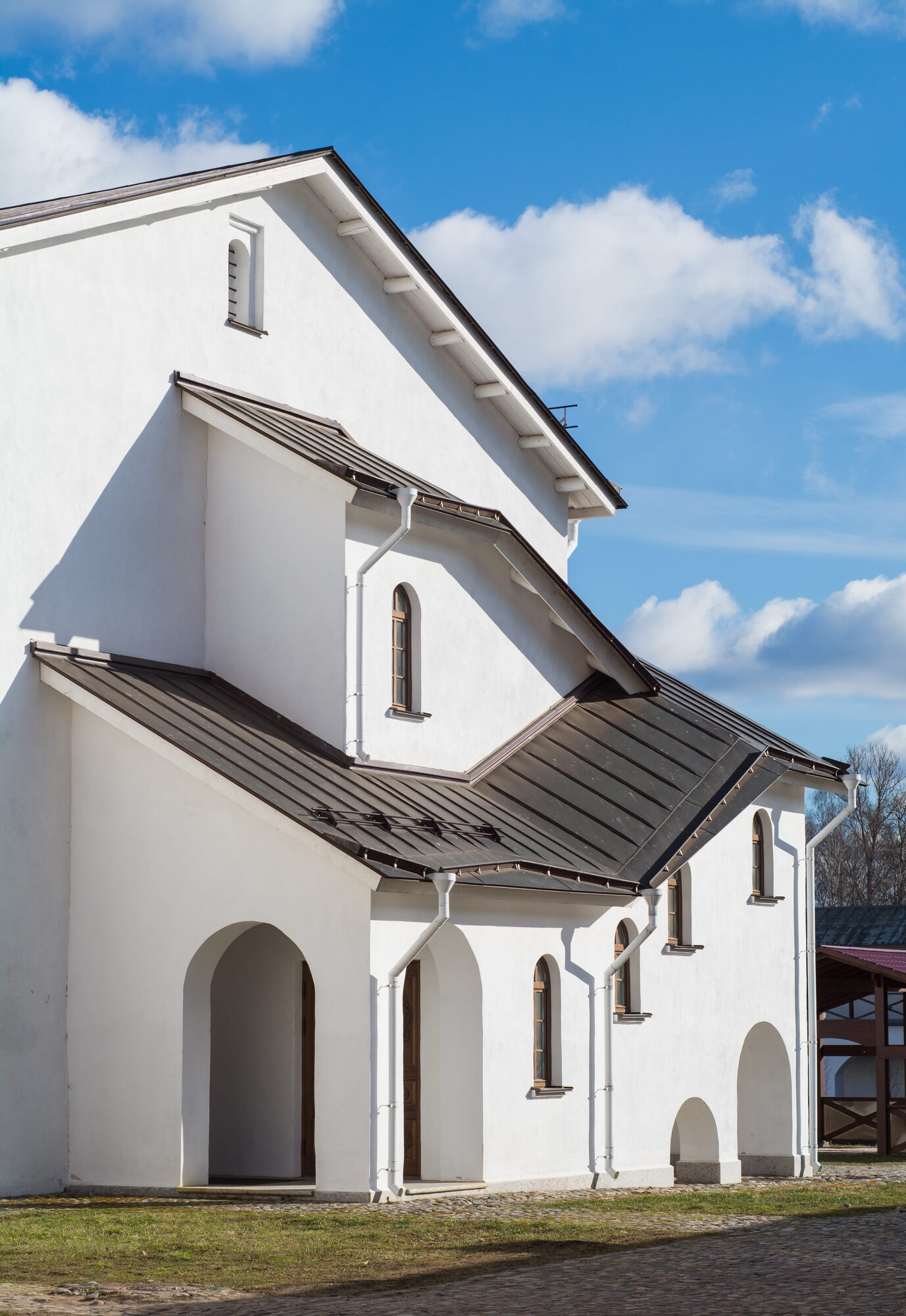 Exterior view of a commercial building with a well-maintained roof