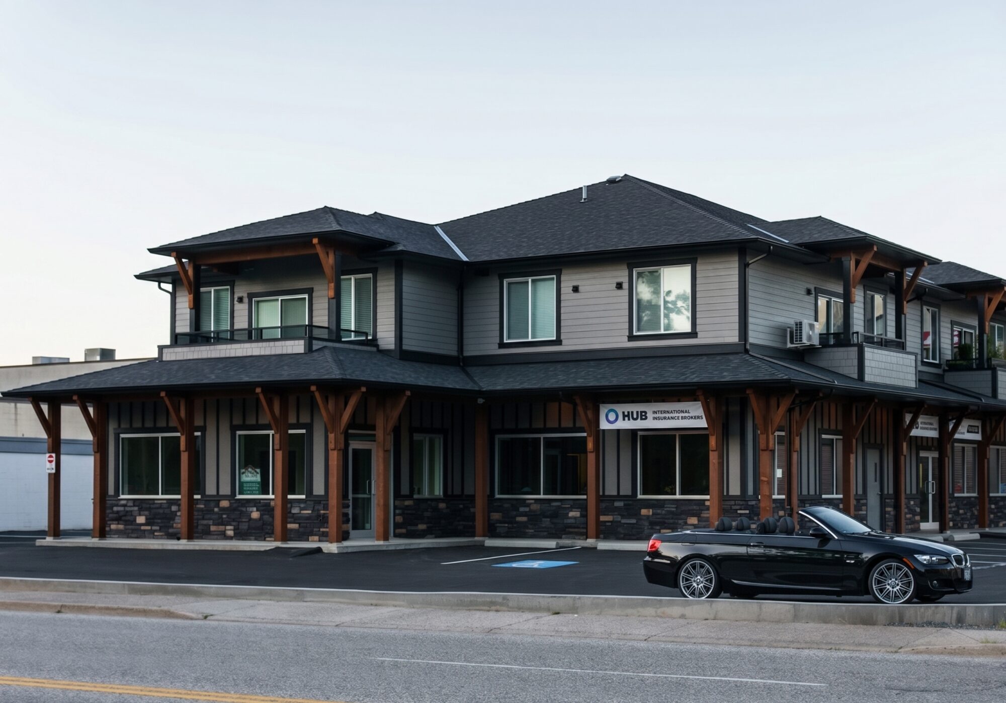 Commercial building exterior showing a low-slope roof after storm season